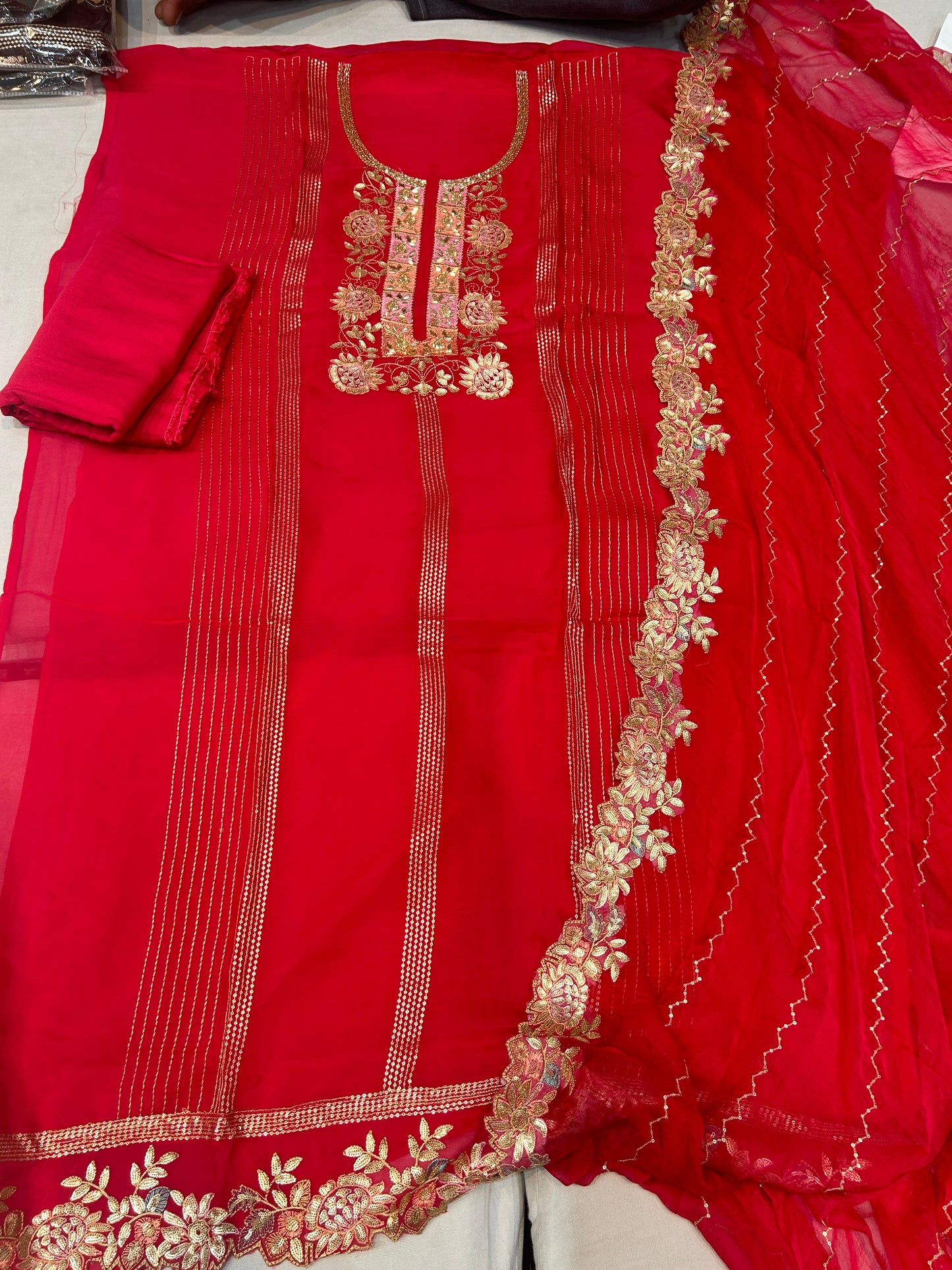 Red Fancy women Unstitched Suit