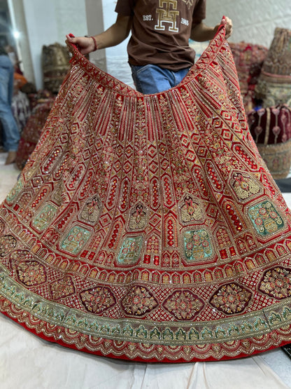 Elegante lehenga nupcial en color rojo y rosa