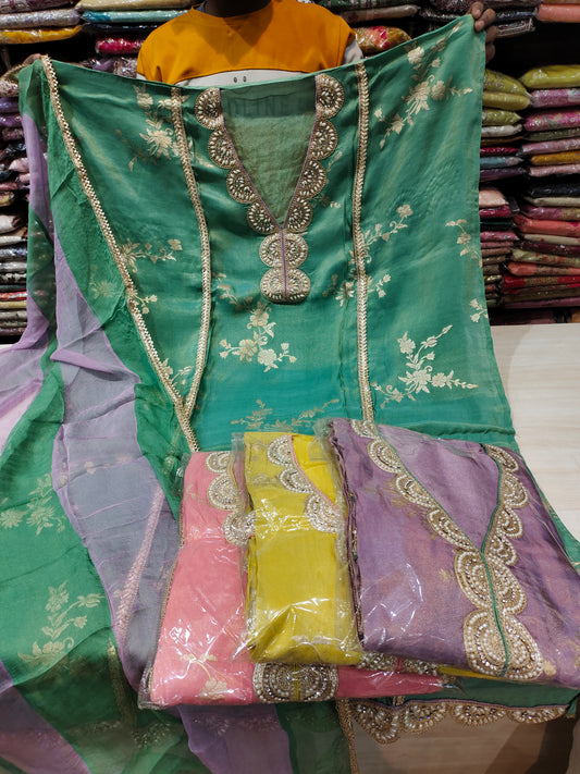 Fantastic green unstitched salwar suit dress material(free size)