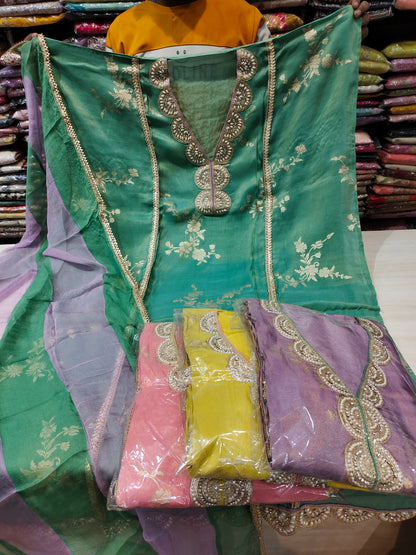 Fantastic green unstitched salwar suit dress material(free size)