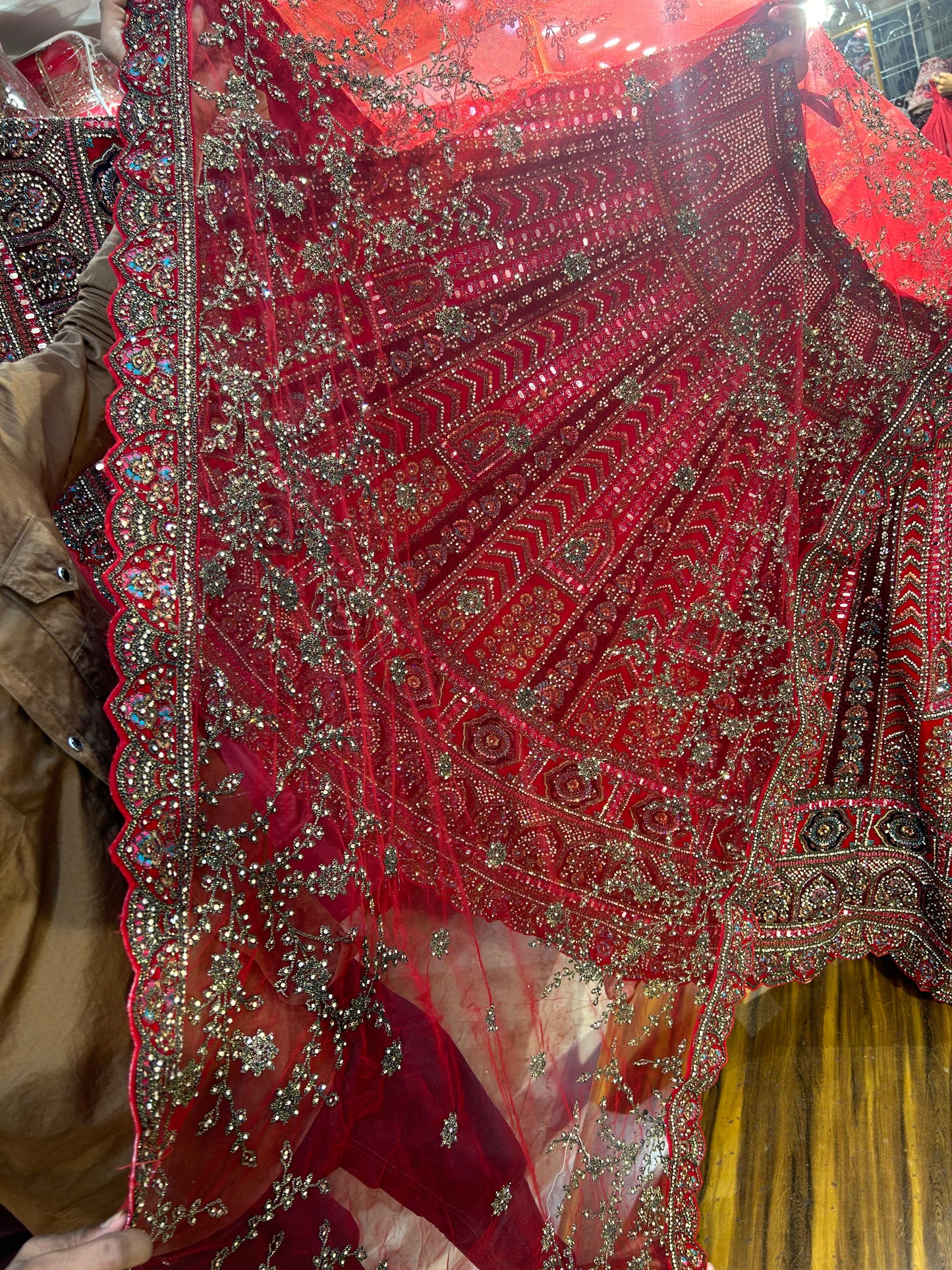 Tremendous red bridal cutwork Lehenga