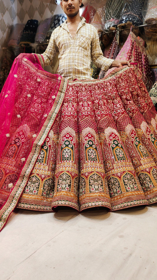 Hermoso lehenga rojo con patrón de bolas