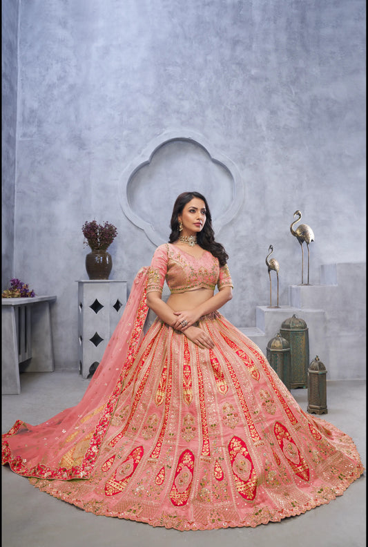 Lehenga de diseñador en color melocotón rosa bebé