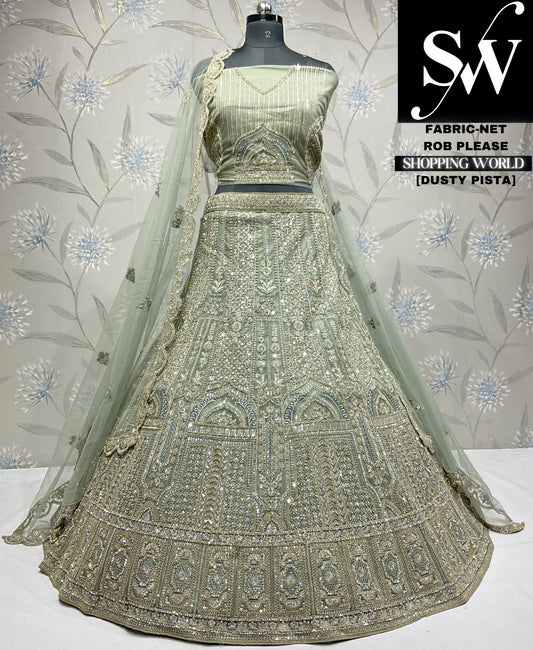 Deliciosa lehenga de color verde pistacho polvoriento