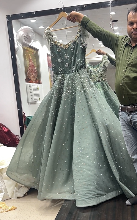 Aqua green mehendi shinning gown dress