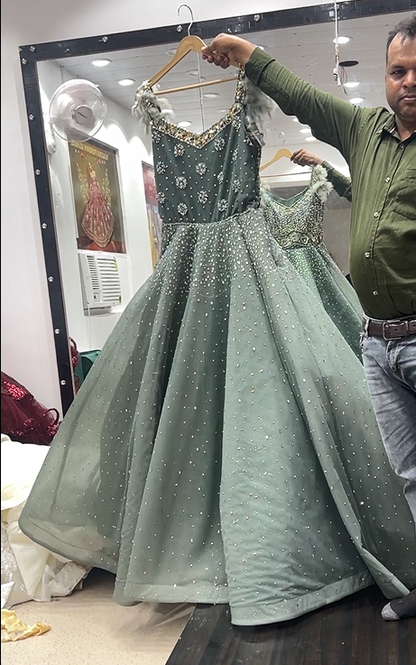 Aqua green mehendi shinning gown dress