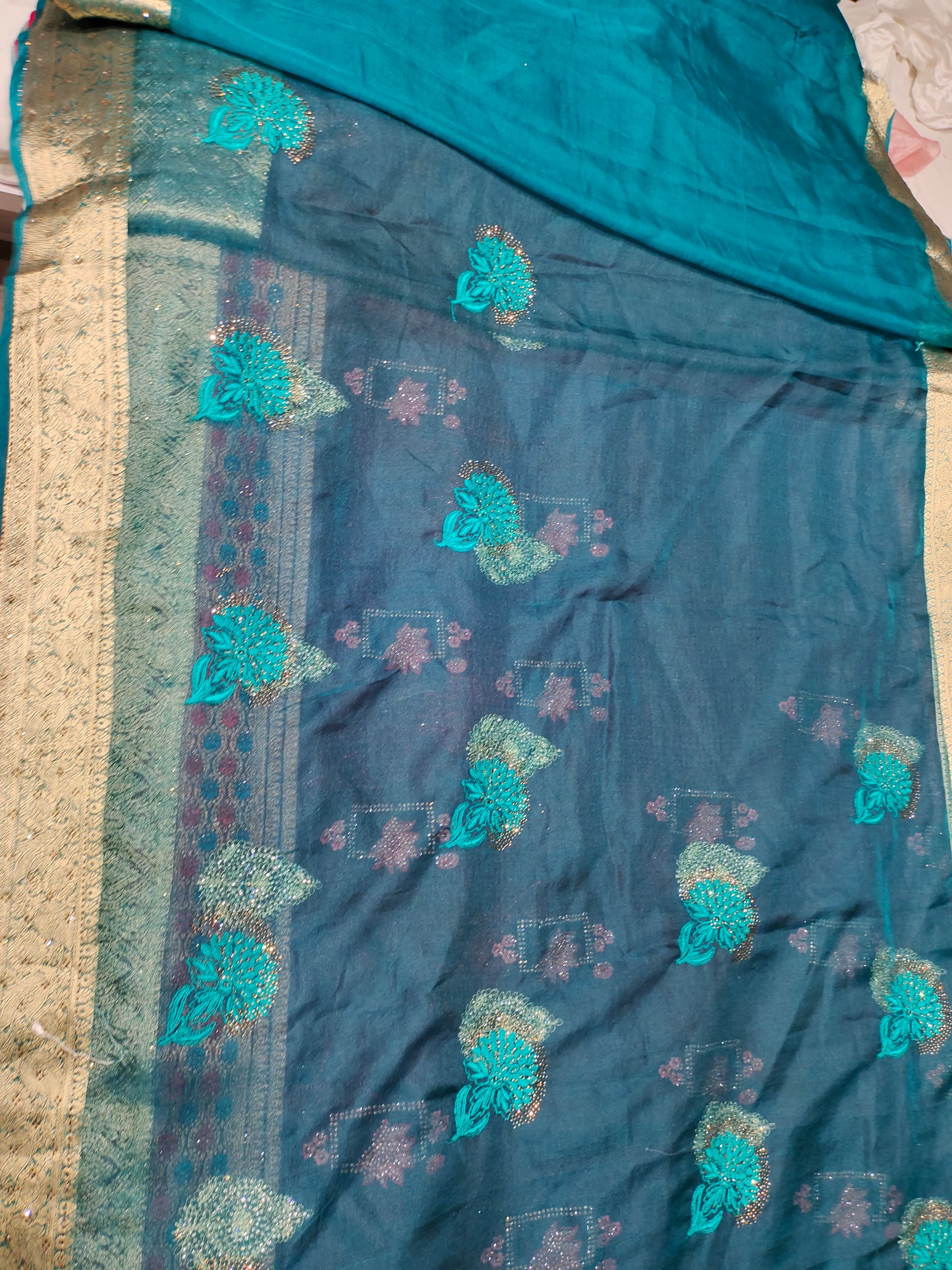 Good looking bandhani print golden border blue saree