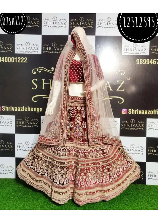 Pleasing peacock maroon bridal lehenga