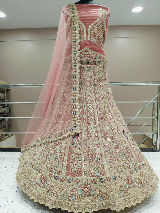 Impresionante lehenga de pavo real rosa