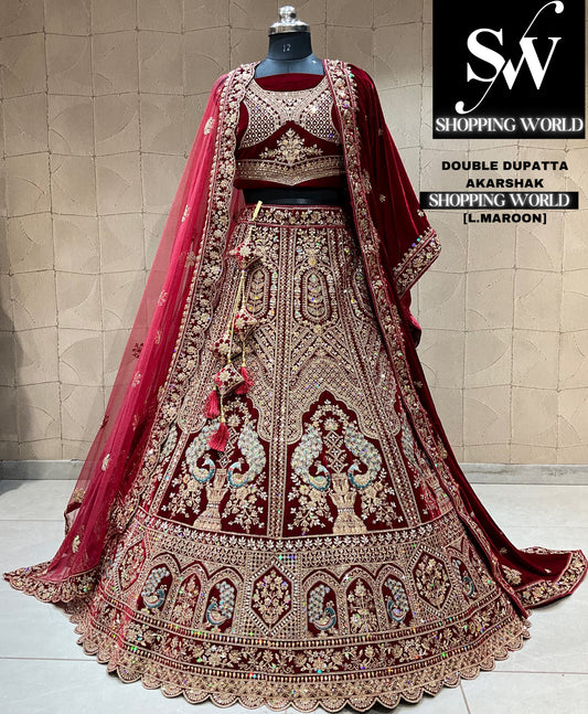 Lehenga nupcial majestuosa en color granate claro con diseño de pavo real