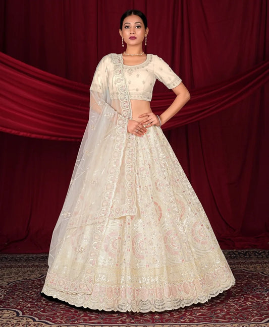 Lehenga majestuosa de color blanco y rosa