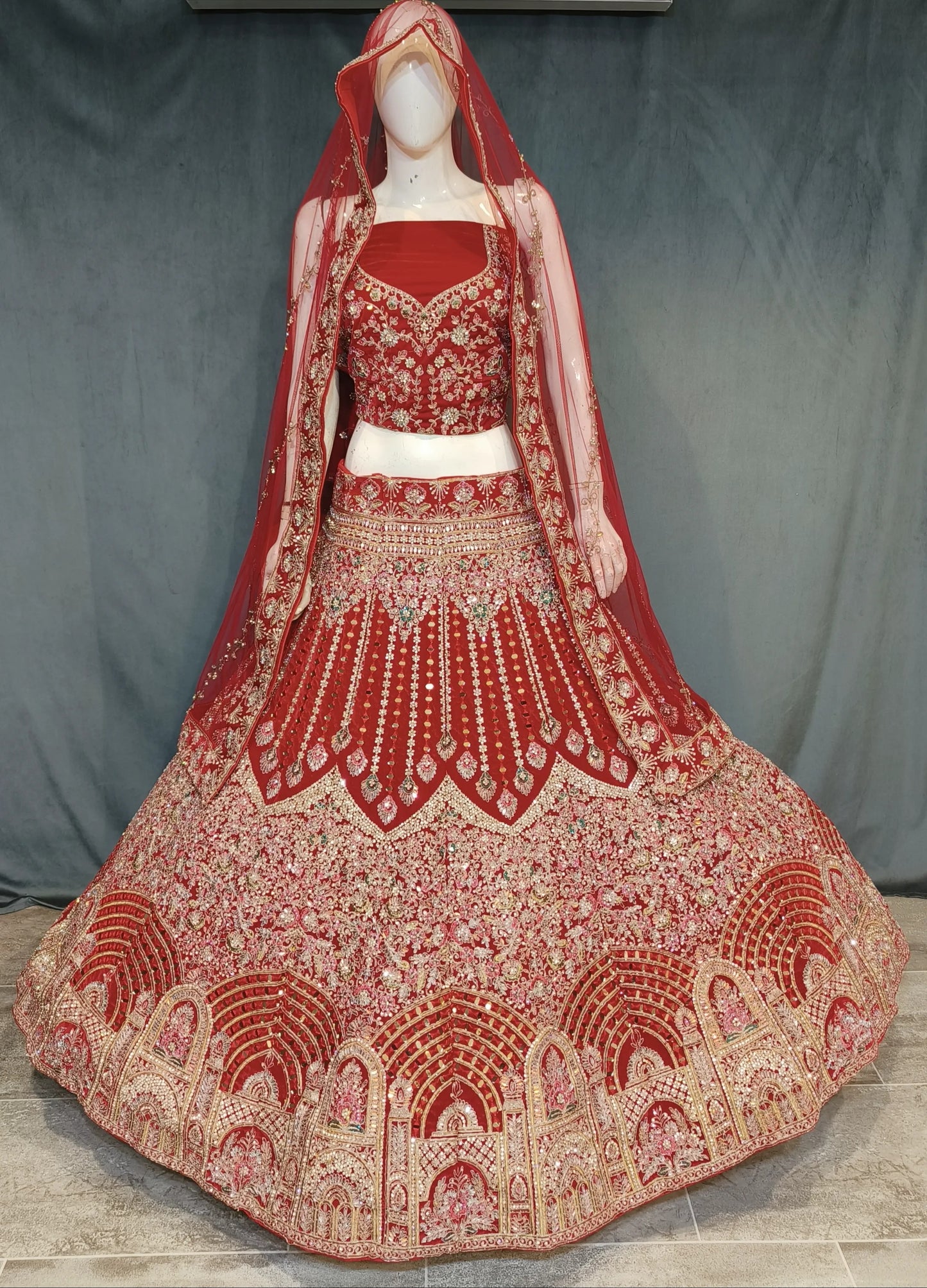 Famous red jhumka bridal lehenga