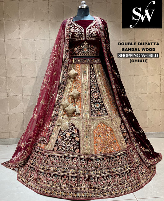 Atractiva lehenga nupcial con doble dupatta color granate de Chiku