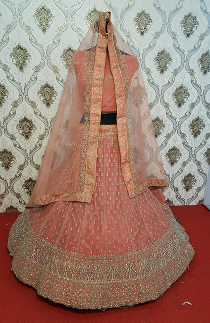 Glamorous orange net fabric Lehenga