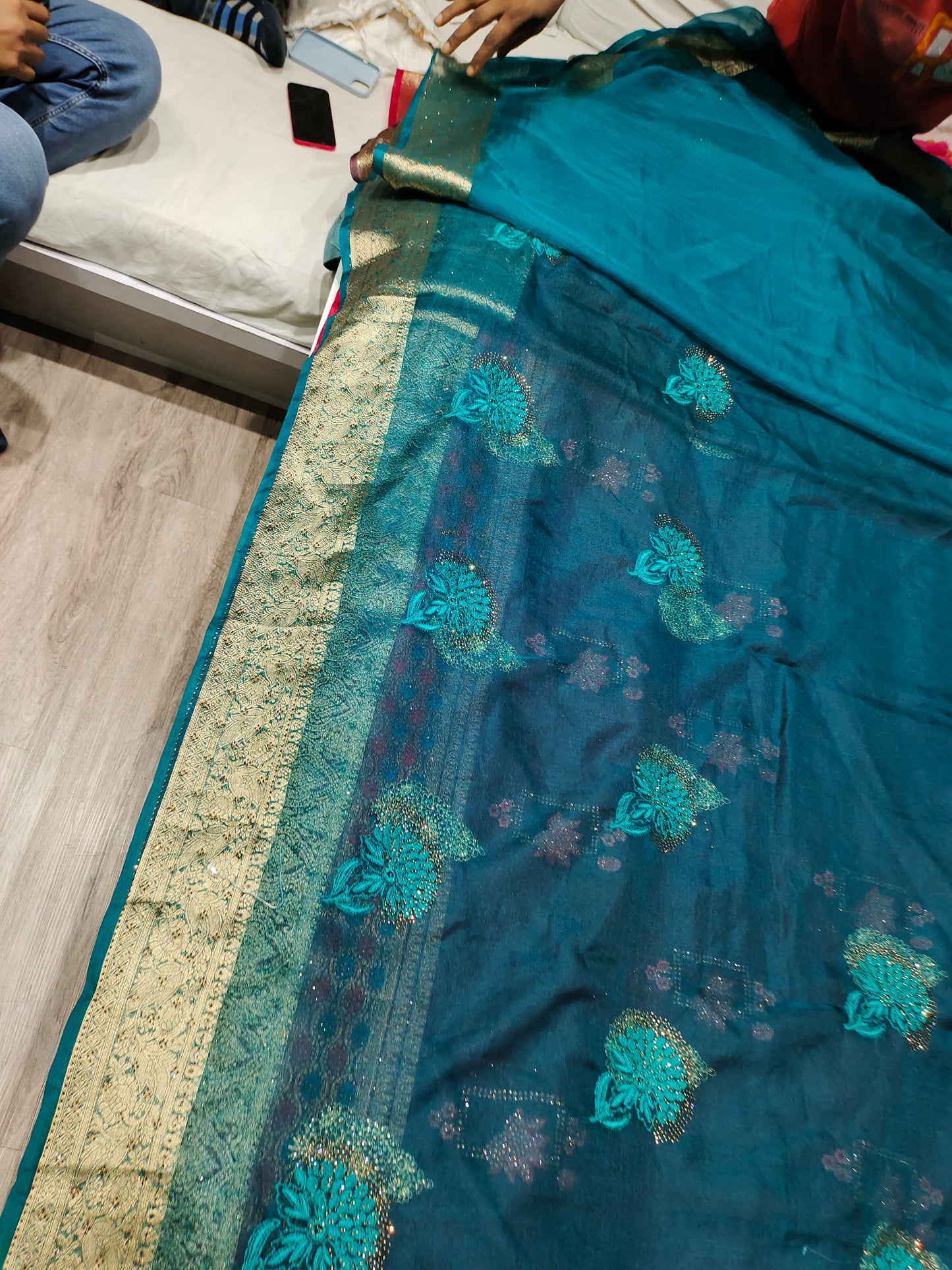 Good looking bandhani print golden border blue saree