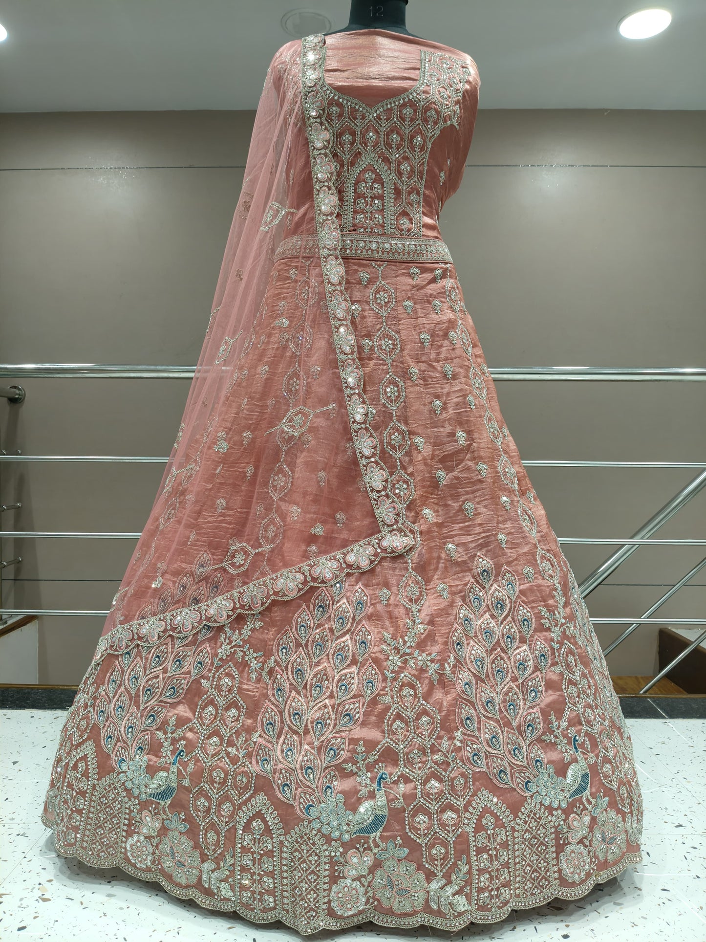 Fabulous peach peacock lehenga