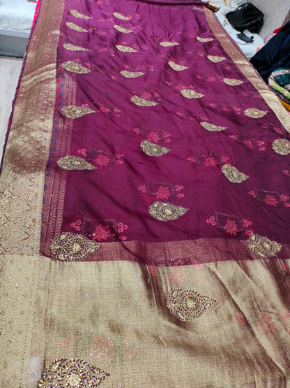 Gorgeous bandhani print purple maroon golden border saree .