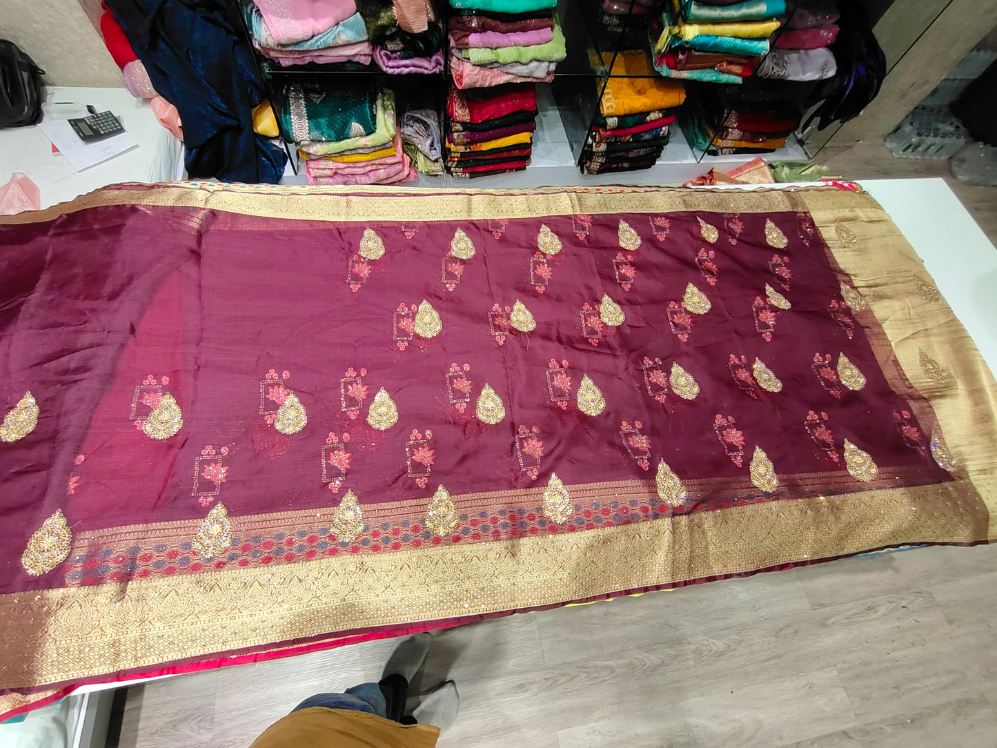 Gorgeous bandhani print purple maroon golden border saree .