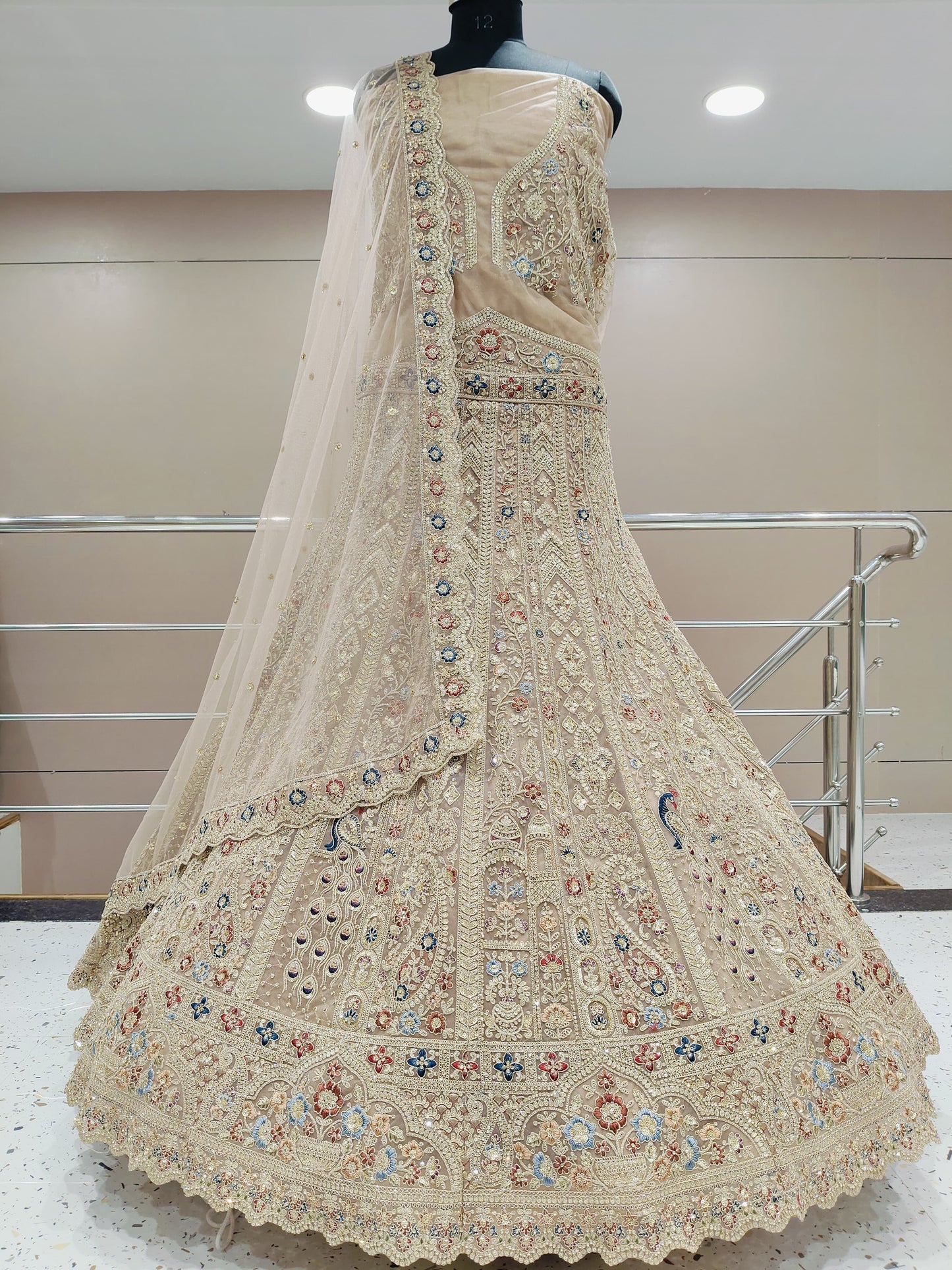 Gorgeous cream off white peacock lehenga