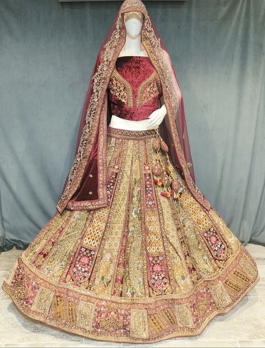 Tremendous peacock red golden bridal lehenga