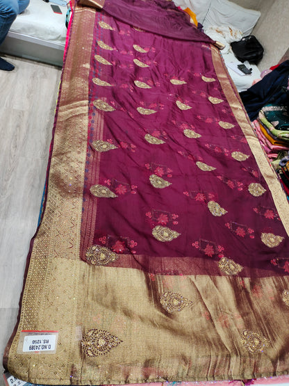 Gorgeous bandhani print purple maroon golden border saree .