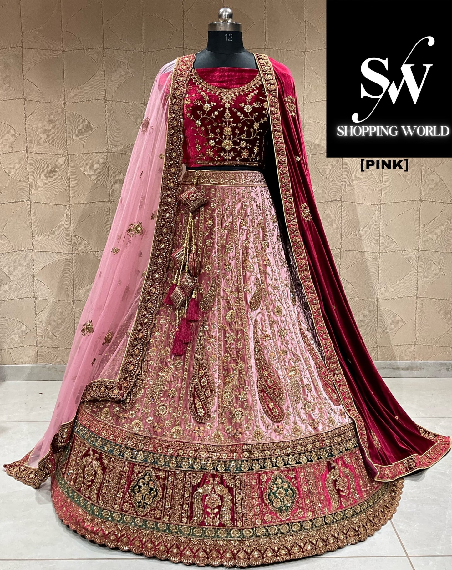 Lehenga nupcial glamurosa de color rosa con doble duptta