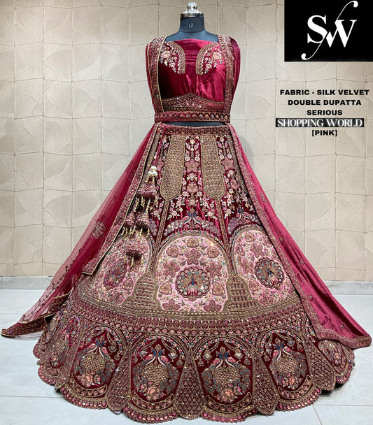 Preciosa lehenga de novia de doble capa con estampado de pavo real en color rosa granate