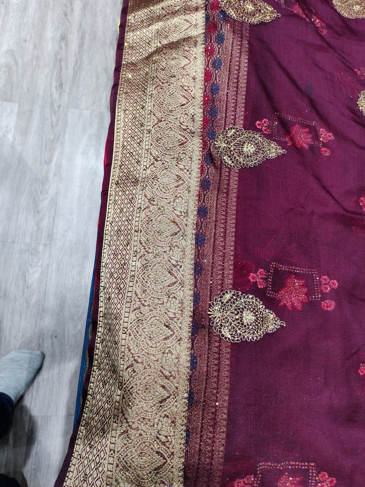 Gorgeous bandhani print purple maroon golden border saree .