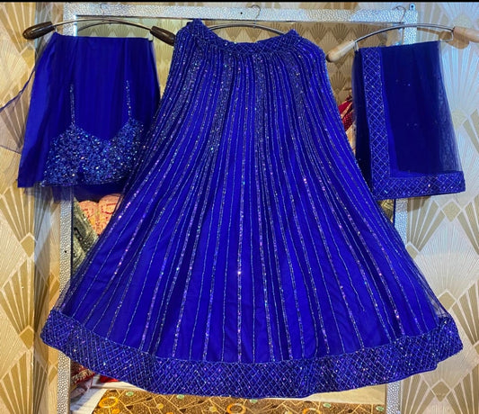 Compras en el mundo de las lehengas azules hechas a mano